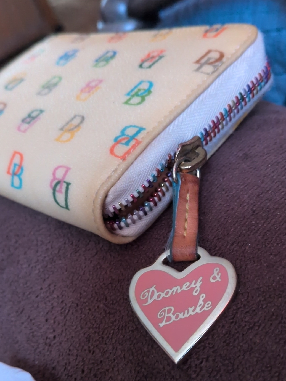 Dooney & Bourke Cream Multicolor Monogram Zip Wallet with Pink Heart Charm